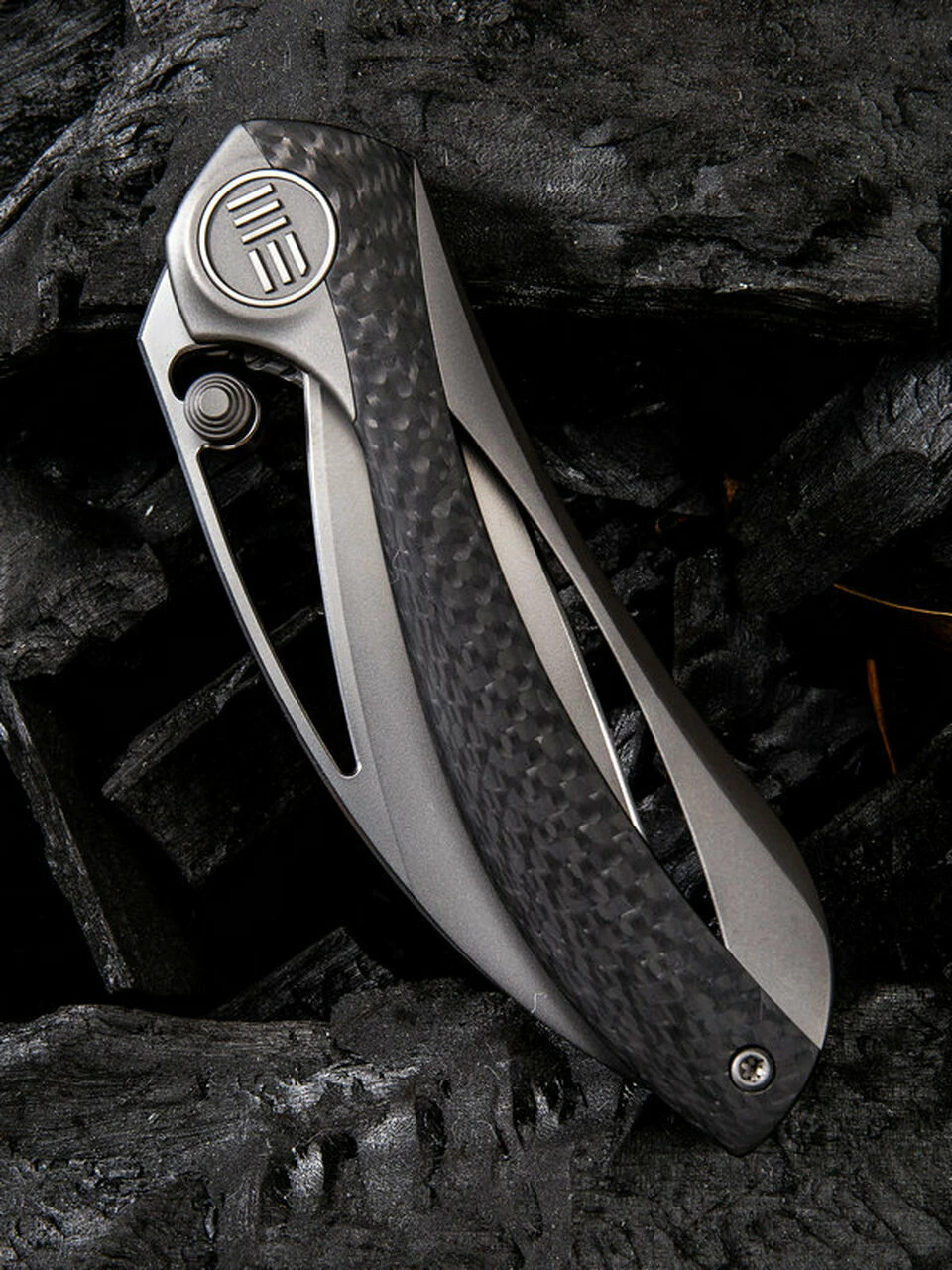 We Knife Co. We Knife Pleroma Linerlock Folder 821A, 2.95” Bohler M390 Wharncliffe Satin Plain Blade, Titanium Inlay Carbon Fiber Handle 3 We Knife Co. We Knife Pleroma Linerlock Folder 821A, 2.95” Bohler M390 Wharncliffe Satin Plain Blade, Titanium Inlay Carbon Fiber Handle - Image 3