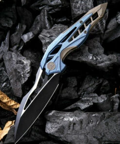 We Knife Co. We Knife Arrakis Framelock Folder 906B, 3.45” Bohler M390 Black Wharncliffe Plain Blade, Blue and Bronze Stonewash Titanium Handle