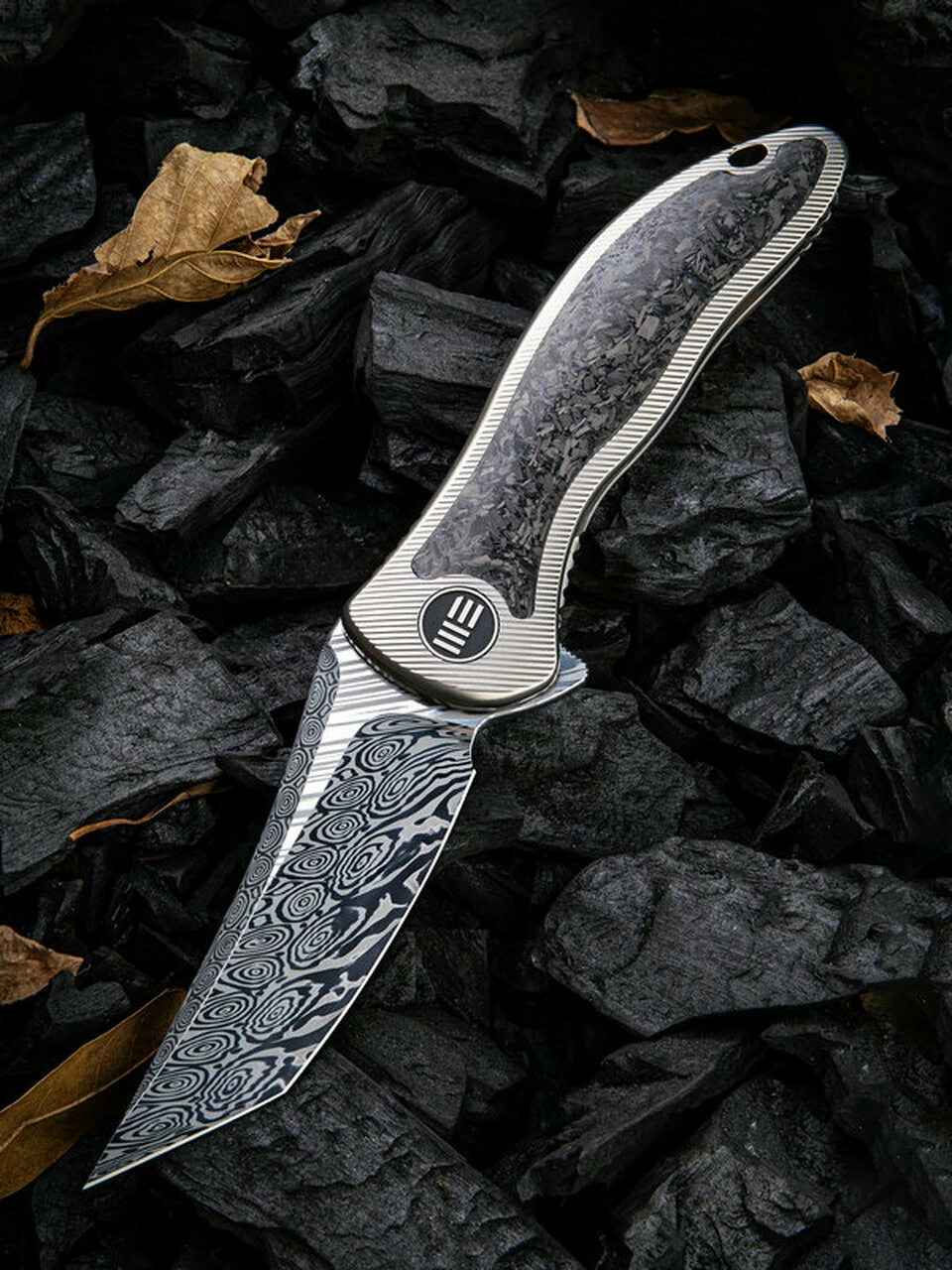 We Knife Co. We Knife Synergy 2 Framelock Folder 912CFDS2, 3.49" Heimskringla Damasteel Tanto Plain Blade, 6AL4V Titanium with Shredded Carbon Fiber Inlay Handle 1 We Knife Co. We Knife Synergy 2 Framelock Folder 912CFDS2, 3.49" Heimskringla Damasteel Tanto Plain Blade, 6AL4V Titanium with Shredded Carbon Fiber Inlay Handle