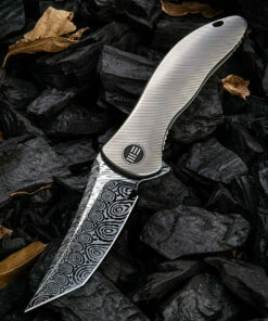 We Knife Co. We Knife Synergy 2 Framelock Folder 912DS2, 3.49" Heimskringla Damasteel Tanto Plain Blade, 6AL4V Titanium Satin Polished Grooved Handle