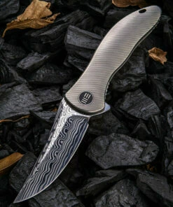 We Knife Co. We Knife Synergy 2 Framelock Folder 912DS1, 3.49" Heimskringla Damasteel Trailing Point Plain Blade, 6AL4V Titanium Satin Polished Grooved Handle