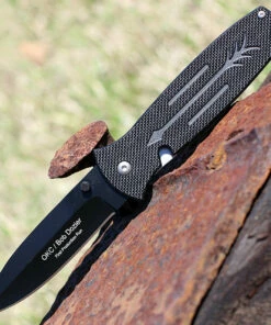 Ontario 9101 Dozier Arrow, 3.15 in D2 Black Plain Blade, Black G-10 Handles