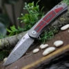 Kansept Knives K2003A4 Gremlin, 2.91" Damasteel Stonewashed Plain Blade, Titanium/Carbon Fiber Handle