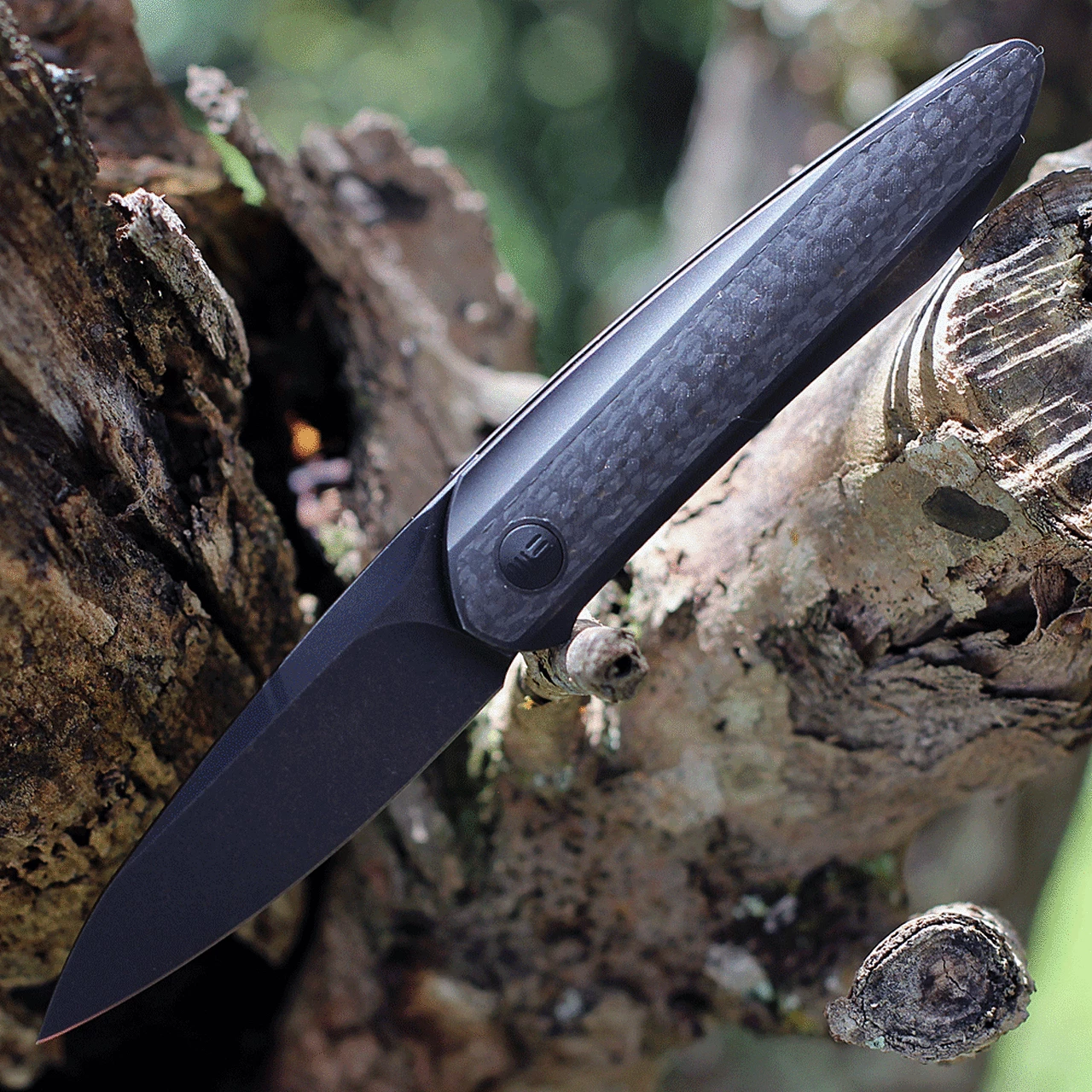 WE Knife Co. Black Void Opus - Black Ti / CF (2.84" CPM-20CV Black SW) 2010V-1 1 WE Knife Co. Black Void Opus - Black Ti / CF (2.84" CPM-20CV Black SW) 2010V-1