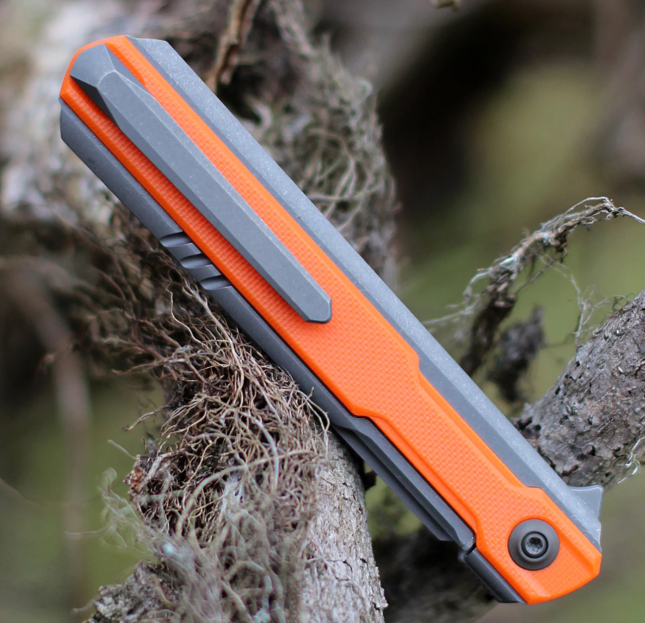 WE Knife Co. Peer, 2015A, 3.5" CPM 20CV Stonewashed Blade, Gray Titanium Handle with Orange G-10 Overlay 4 WE Knife Co. Peer, 2015A, 3.5" CPM 20CV Stonewashed Blade, Gray Titanium Handle with Orange G-10 Overlay - Image 4