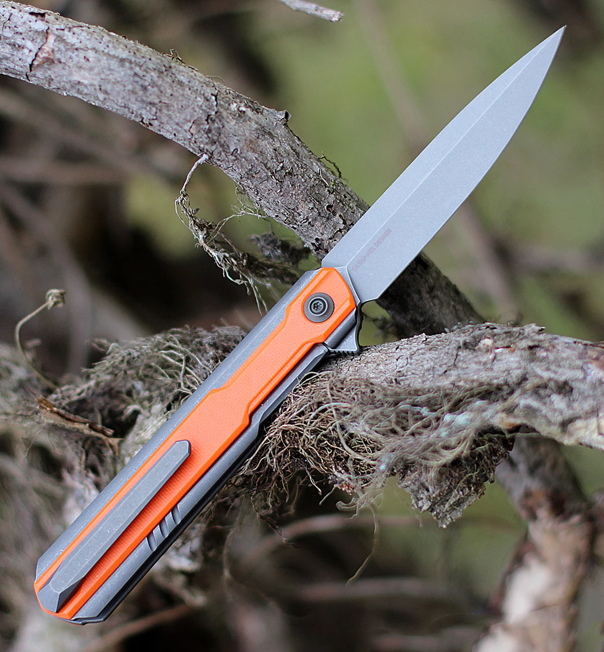 WE Knife Co. Peer, 2015A, 3.5" CPM 20CV Stonewashed Blade, Gray Titanium Handle with Orange G-10 Overlay 2 WE Knife Co. Peer, 2015A, 3.5" CPM 20CV Stonewashed Blade, Gray Titanium Handle with Orange G-10 Overlay - Image 2