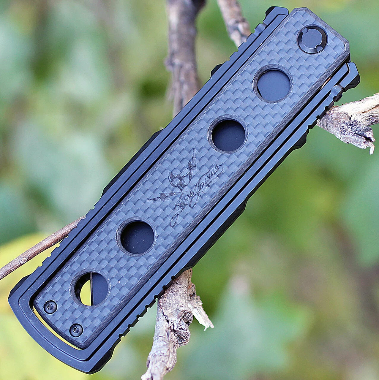 Jesse James Knife Co. Nomad Titanium/Carbon Fiber-JJKC2B, 4.0 in. Tanto Uddeholm AEB-L Steel Black PlainEdge 2 Jesse James Knife Co. Nomad Titanium/Carbon Fiber-JJKC2B, 4.0 in. Tanto Uddeholm AEB-L Steel Black PlainEdge - Image 2