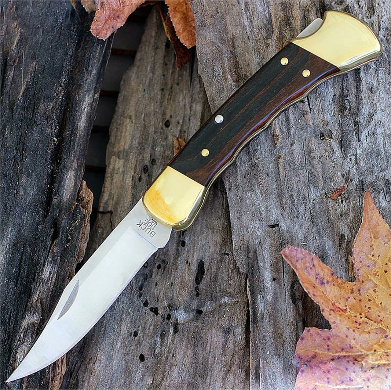 Buck Knives Buck BU110FG Folding Hunter, 3.75" 420HC Plain Blade, Finger Grooved Woodgrain Handle, Leather Sheath 1 Buck Knives Buck BU110FG Folding Hunter, 3.75" 420HC Plain Blade, Finger Grooved Woodgrain Handle, Leather Sheath