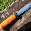 Marttiini Knives Marttiini Skinning Knife Orange With Titanium Coated Handle