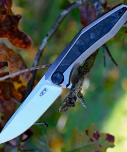 Zero Tolerance 0470 Sinkevich , 3.4" CPM 20CV Plain Blade, Titanium w/Marbled Carbon Fiber Insert